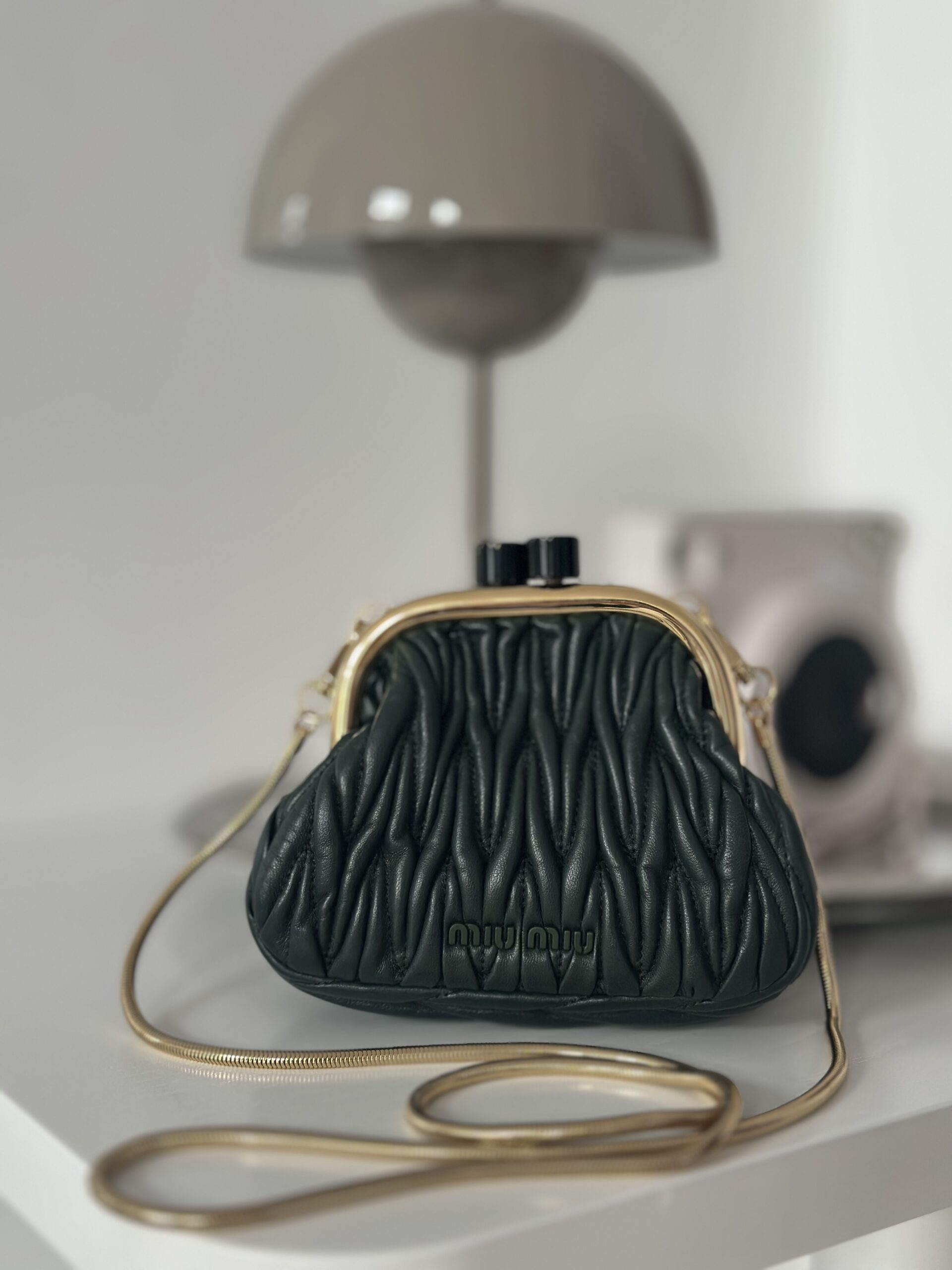 Miu Miu mała elegancka w kolorze ciemnej zieleni